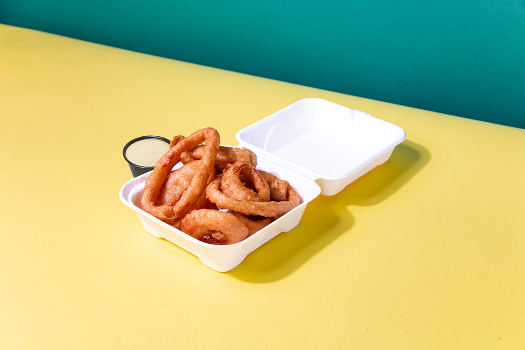 onion rings in takeout container